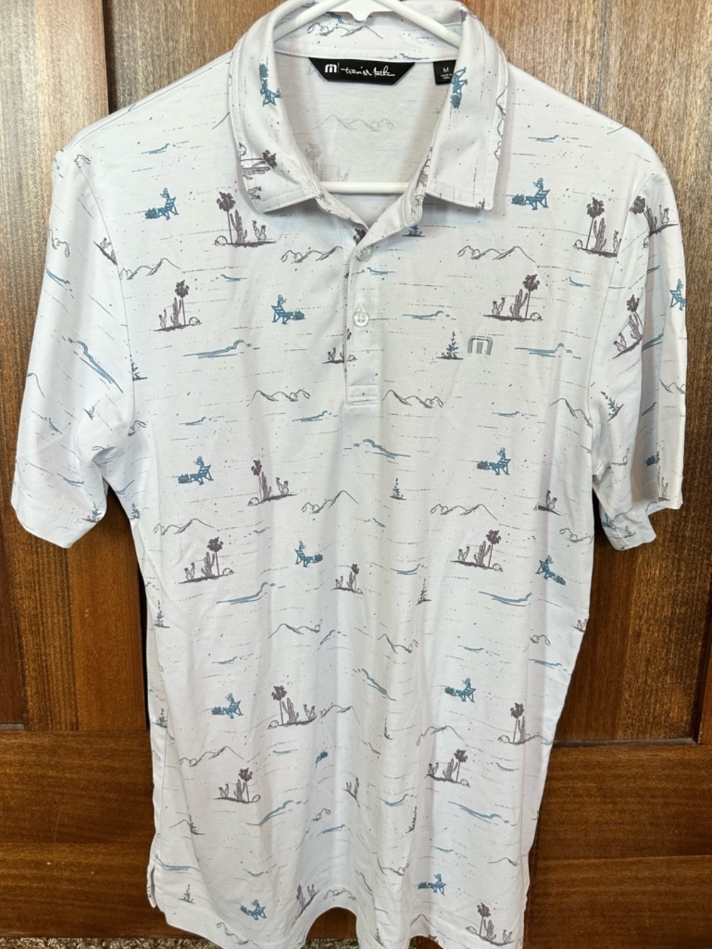 Travis Mathew Men's White Polo with Blue & Brown Desert Print